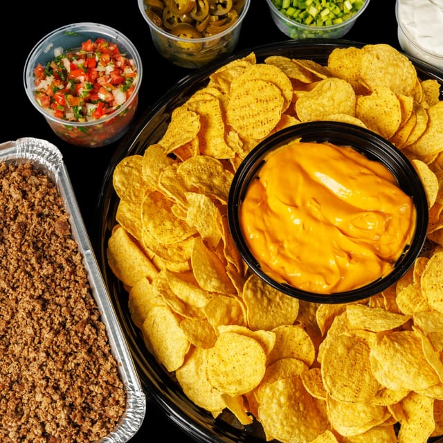 The Supreme Nacho Feast Tray.