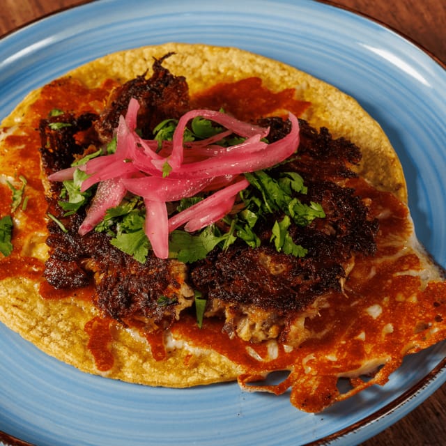 Slow-Cooked Carnitas Taco.